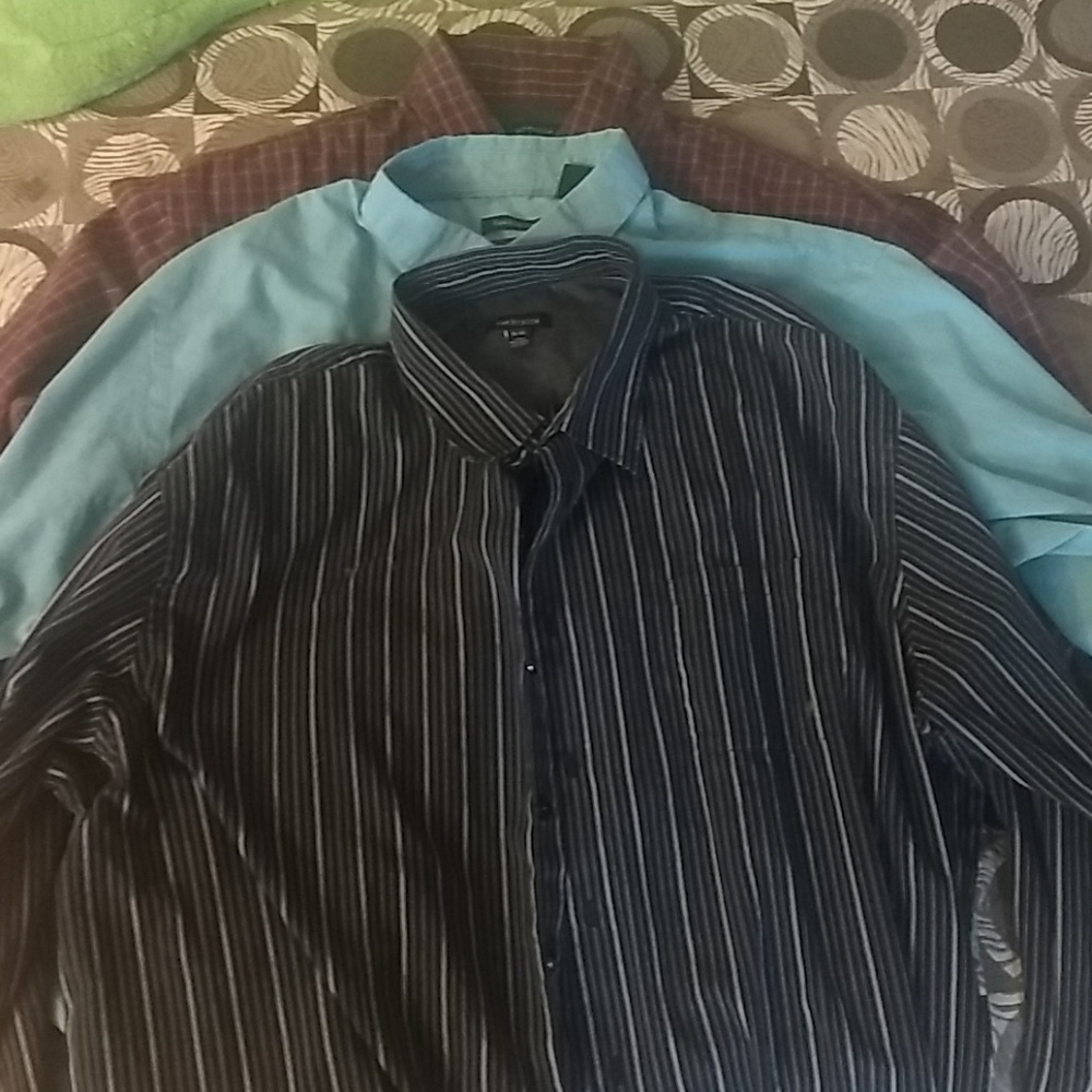 4 XXL dress shirts. 3 are VanHeusen one is Champs